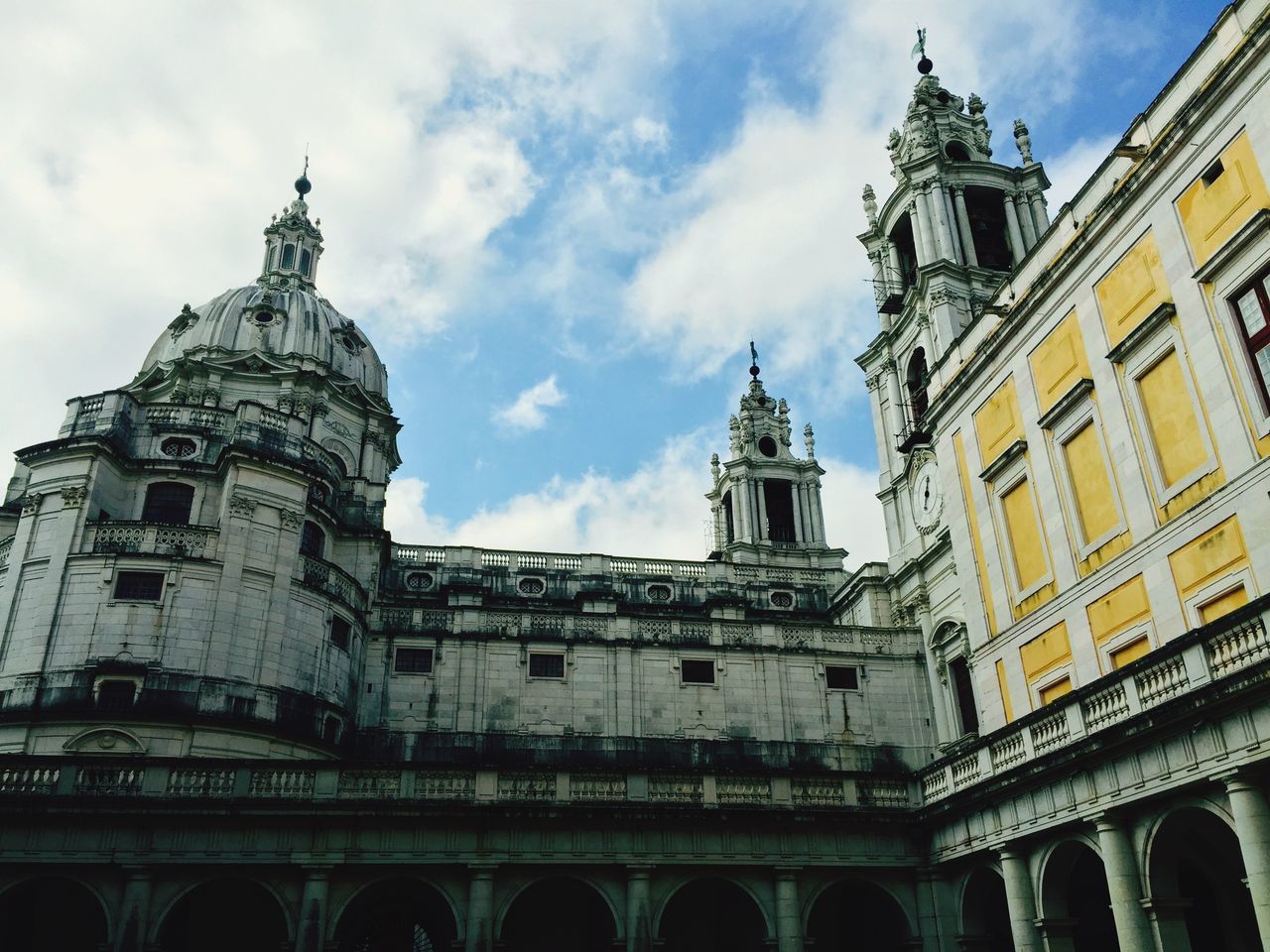 architecture, building exterior, built structure, religion, place of worship, low angle view, church, cathedral, spirituality, sky, travel destinations, famous place, tourism, travel, history, capital cities, city, international landmark