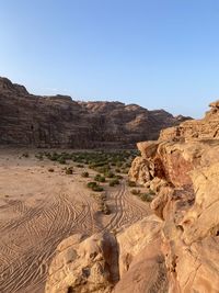 Rock formations in desert against clear sky