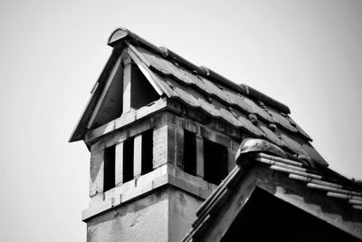 Low angle view of old building against clear sky