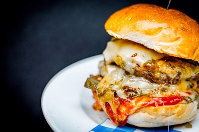 Close-up of burger in plate on table