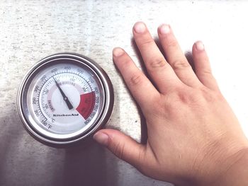 High angle view of person holding hands