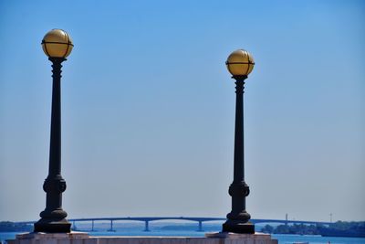 Low angle view of street light against clear sky