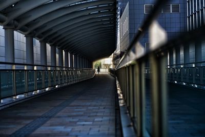 Narrow walkway at railroad station