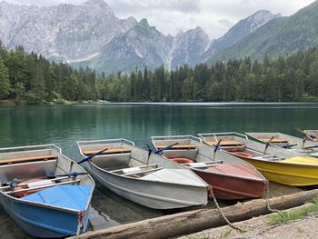 Boats moored in lake