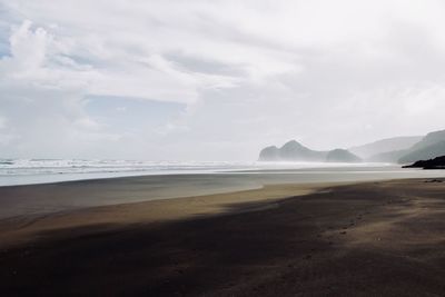 Scenic view of beach against sky