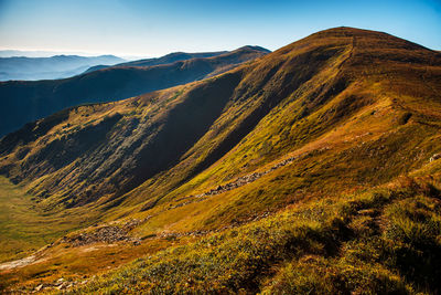 Scenic view of mountain range against sky