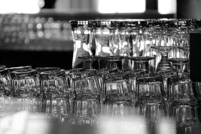 Close-up of wine glasses on table
