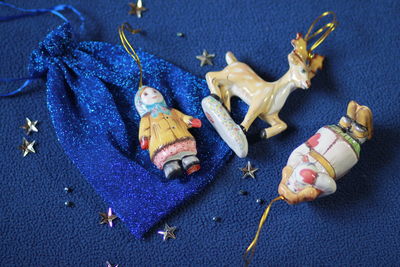 High angle view of stuffed toy against blue background