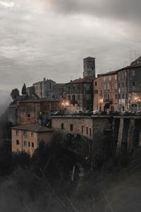 Buildings in city against sky