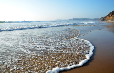 Scenic view of sea against clear sky