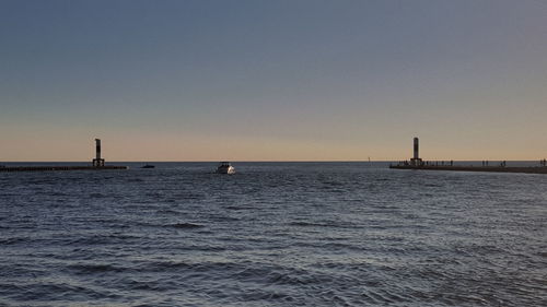 Scenic view of sea against clear sky during sunset