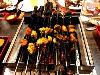 Close-up of various flowers on barbecue grill