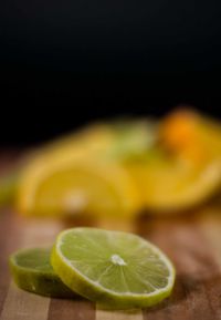 Close-up of lemon slice over black background