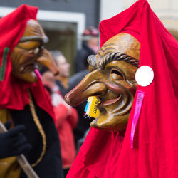 Close-up of statue against red background