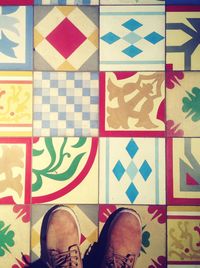 High angle view of shoes on patterned floor
