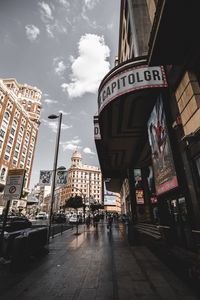 View of buildings in city against sky