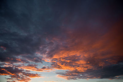 Low angle view of dramatic sky during sunset