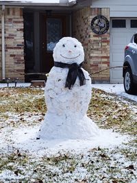 Man in snow covered car