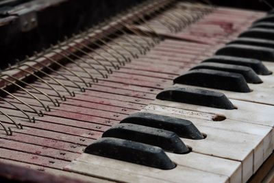 High angle view of piano keys on table