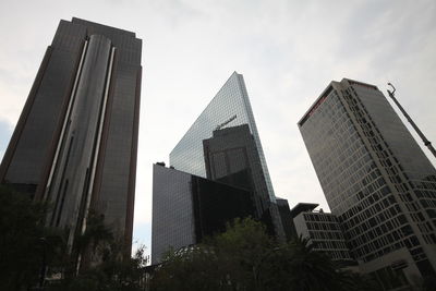 Low angle view of modern buildings against sky