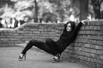 Full length of woman on wall