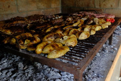 Close-up of meat on barbecue grill