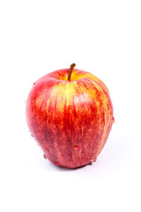Close-up of apple against white background