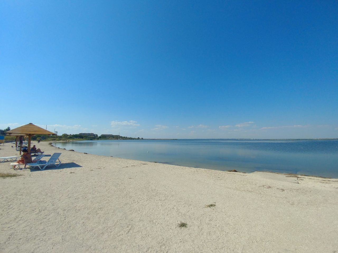 beach, land, water, sky, sea, sand, scenics - nature, beauty in nature, tranquility, blue, tranquil scene, day, nature, copy space, horizon, horizon over water, vacations, trip, clear sky, outdoors