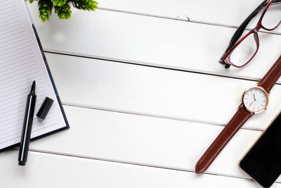 Close-up of clock on table