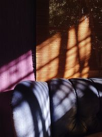 Close-up of woman lying on bed