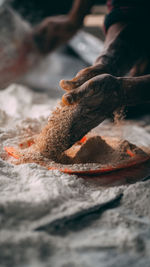 Concrete mixing by hand.