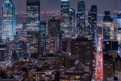 Illuminated buildings in city at night