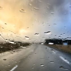 Full frame shot of wet car windshield during rainy season