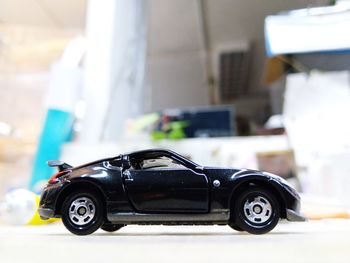 Close-up of toy car on table