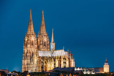 Low angle view of cathedral against clear blue sky