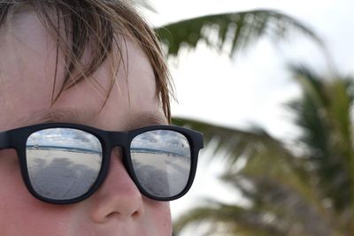 Close-up of boy with sunglasses