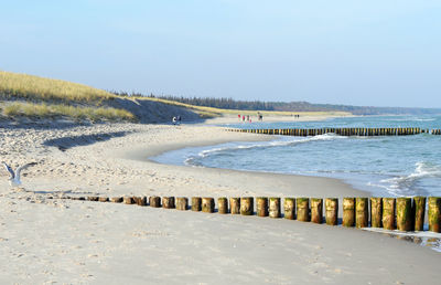 Scenic view of beach against clear sky