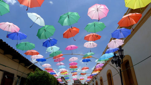 Low angle view of decoration hanging against sky