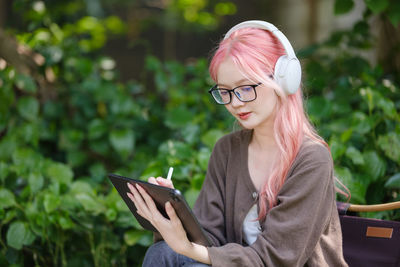 Young woman using laptop