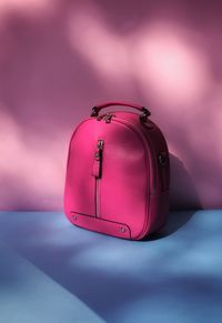 The backpack in fuxia colour