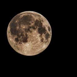 Close-up of moon against clear sky at night