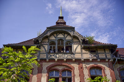 Low angle view of temple building against sky