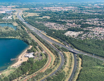 High angle view of city by river