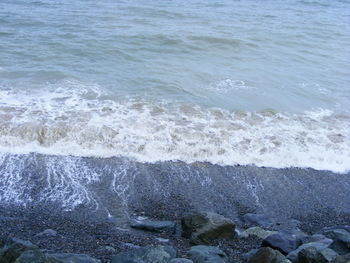 Waves splashing on shore