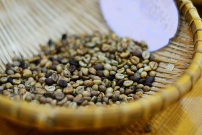 Close-up of coffee beans on table