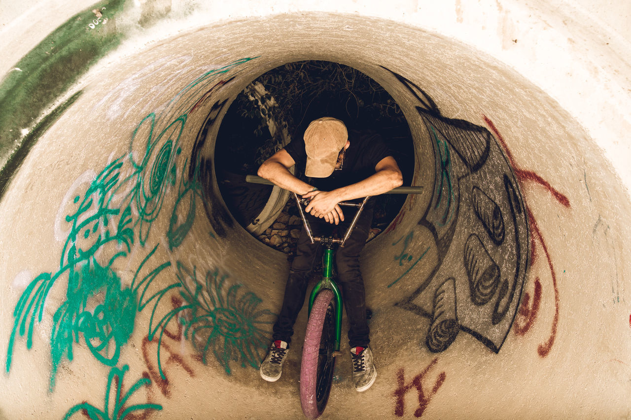 HIGH ANGLE VIEW OF WOMAN LYING DOWN FACE WITH MAN