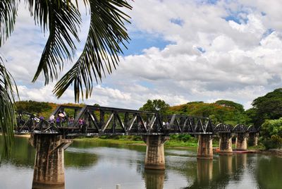 Bridge over river against sky