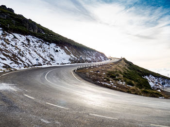 Scenic view of mountain road against sky