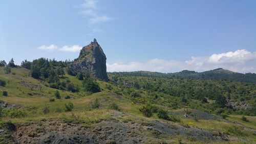 View of landscape against cloudy sky