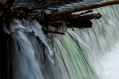 Scenic view of frozen waterfall